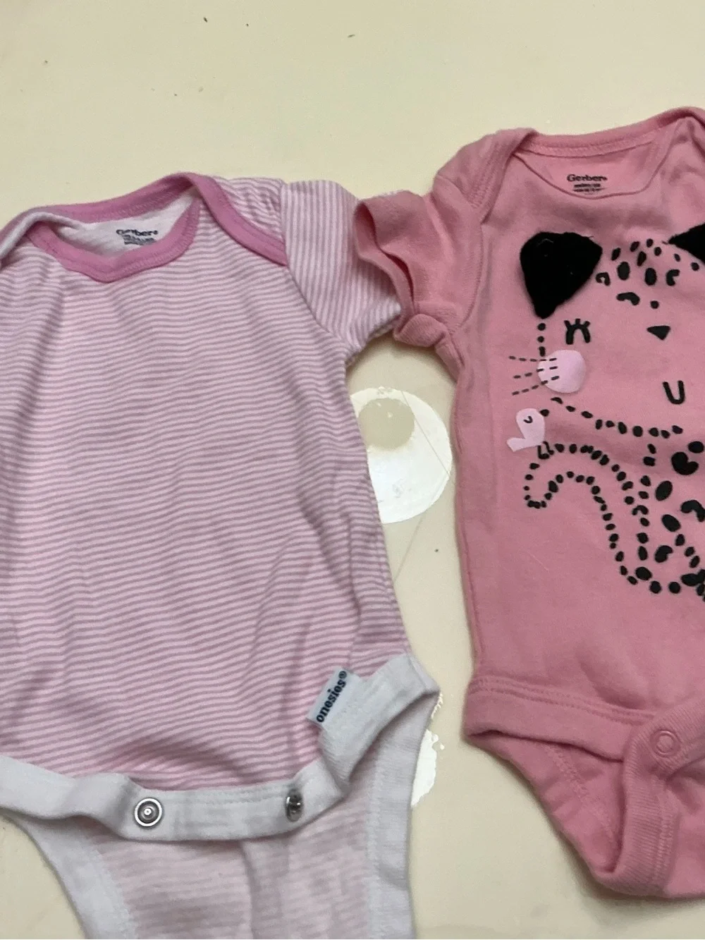 Gerber  Pink Baby One-Piece Bodysuit - Pack of 5 . Size NB fits 5 to 8 pounds